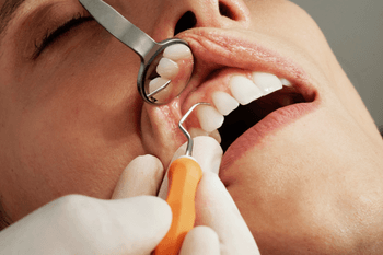 Man with gum disease during dental appointment in Wolverhampton