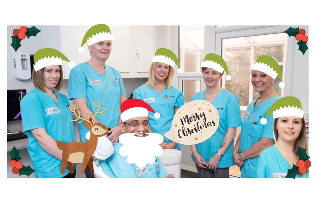 A picture of the Claregate dental team all edited with elf hats and santa hats.