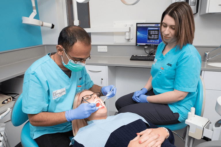 dentist and dental nurse with patient at dental practice in Wolverhampton