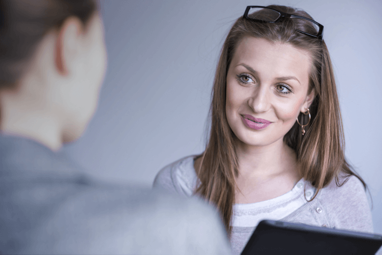 Women holding ipad having a consultation