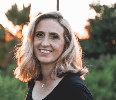 Woman with dental implants smiling in Wolverhampton