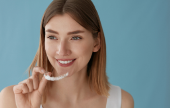 blonde lady with Invisalign braces