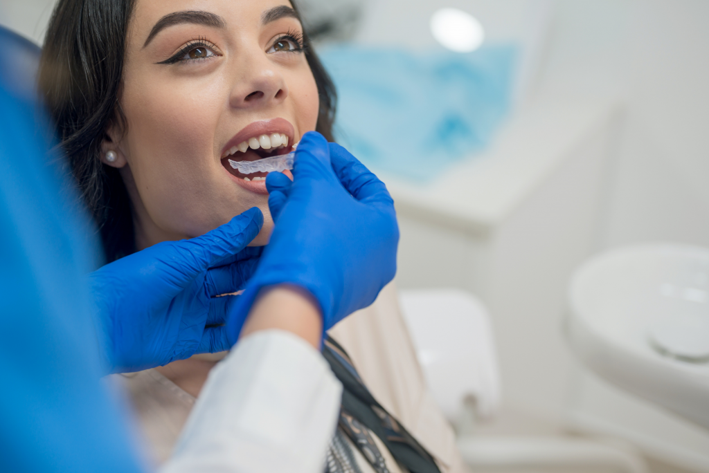 Women receiving her Invisalign Clear Braces