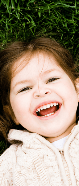 young girl smiling who gets treatment at our family dental practice here in Wolverhampton
