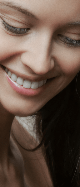 Woman with Invisalign treatment in Wolverhampton