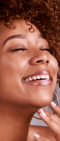 Woman with Invisalign treatment in Wolverhampton smiling