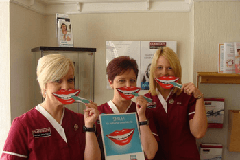 Claregate dental practice team in Wolverhampton with smile mask