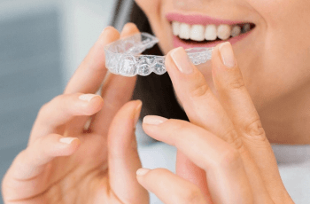woman with Invisalign braces in Wolverhampton dental practice