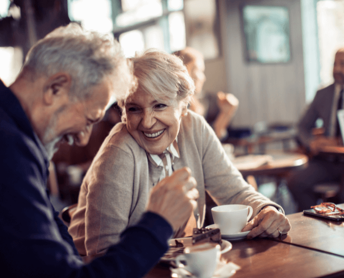 older couple smiling after dentures treatment at claregate dental
