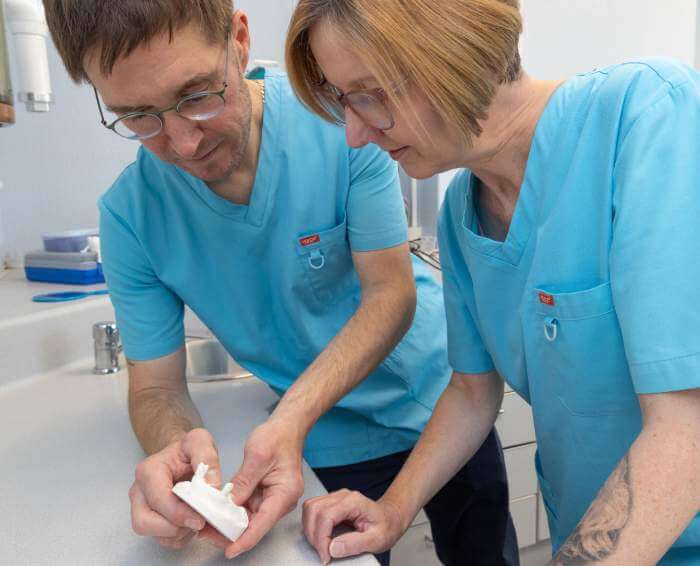 Claregate's CDT looking at dental implant models